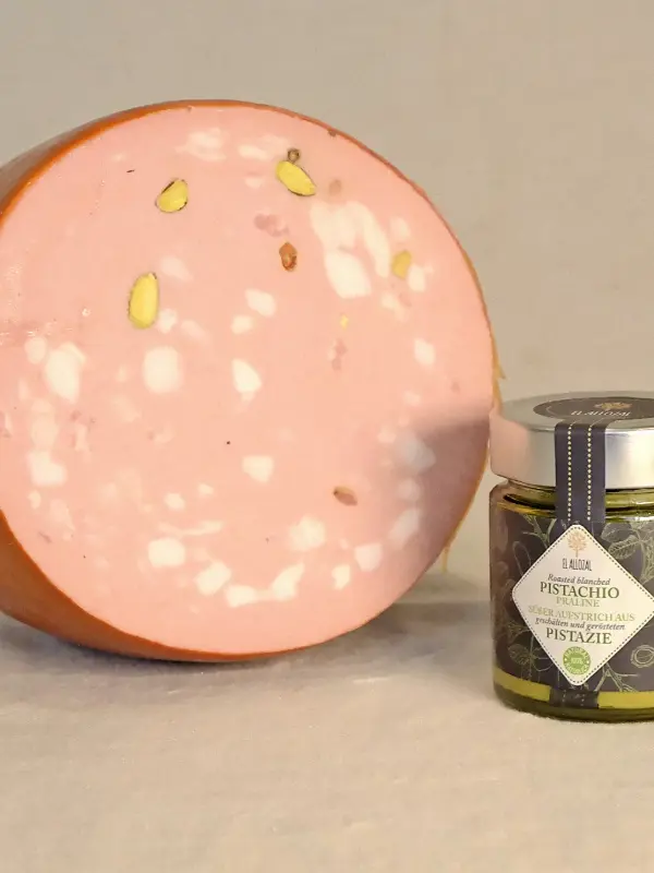 Mortadella Pistasj – italiensk mortadella med pistasjnøtter fra Edizioni Franchi, silkemyk tekstur og nøtteaktig smak, perfekt til antipasti og tapas