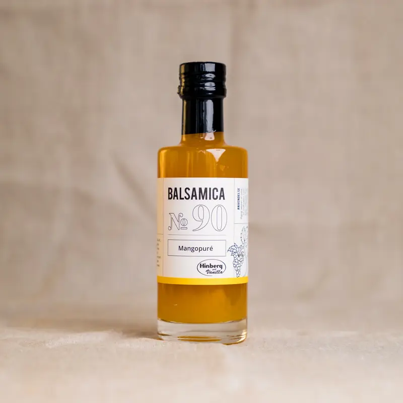Flaske med Mangopuré (250 ml) – naturlig fruktpuré laget av modne mango uten tilsetninger. Ideell til desserter, smoothies og sauser.